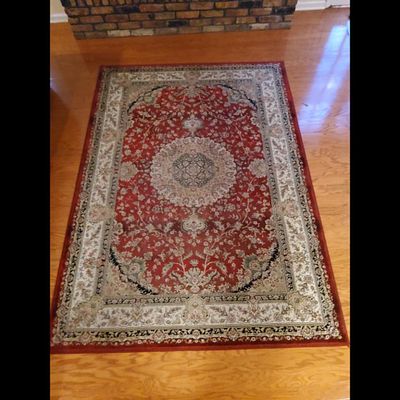 Area Rug - Red, Floral Medallion. Area rug features synthetic fibers and a floral medallion 
