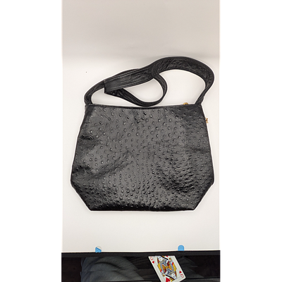 Leather Hobo Bag - Ostrich Embossed, Tassel Accent, Black. Description: Black leather hobo bag 