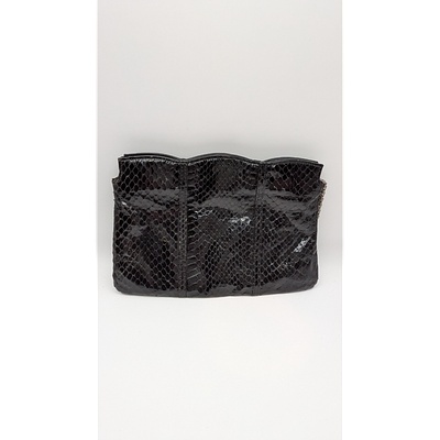 Avril Clutch Purse - snakeskin, shoulder chain. Description: Avril clutch purse in black 