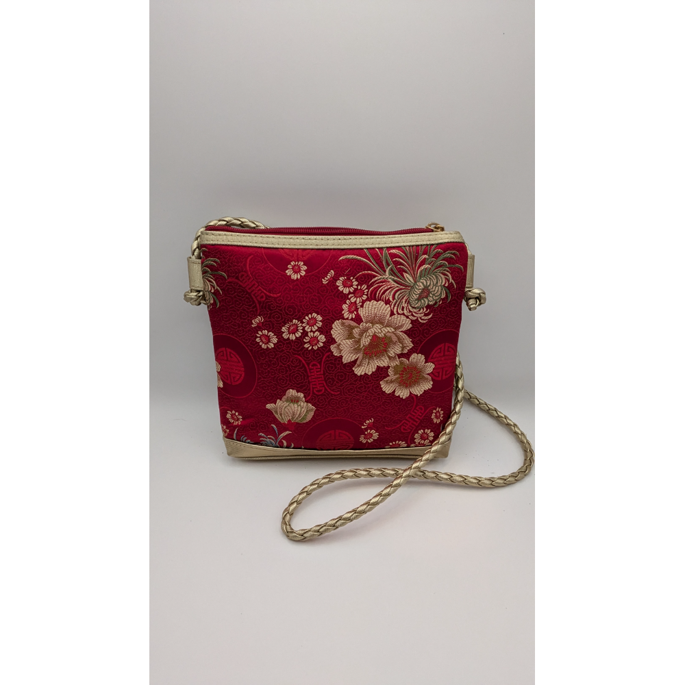 Tiannl Crossbody Bag - Floral, Braided Strap. Description: Tiannl red crossbody bag with a 