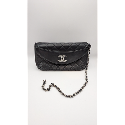Chanel Bag - Quilted Leather, Silver Chain. Description: Black Chanel quilted leather bag with a 