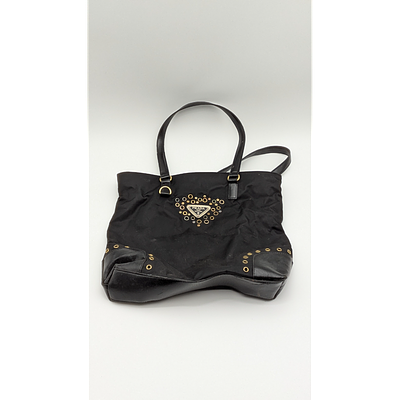 Prada Tote Bag - Nylon, Studded Logo, Black. Description: Prada black nylon tote bag with 