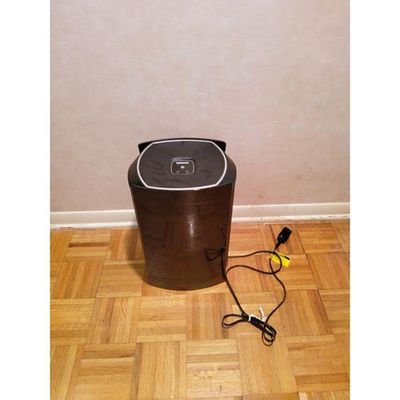 Oreck Air Purifier. ORECK air purifie. Features top-mounted controls for operation. Appears used 
