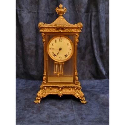 Ansonia Clock Co. Mantel Clock - Ornate Gold. Ornate Ansonia mantel clock with a gilded brass 