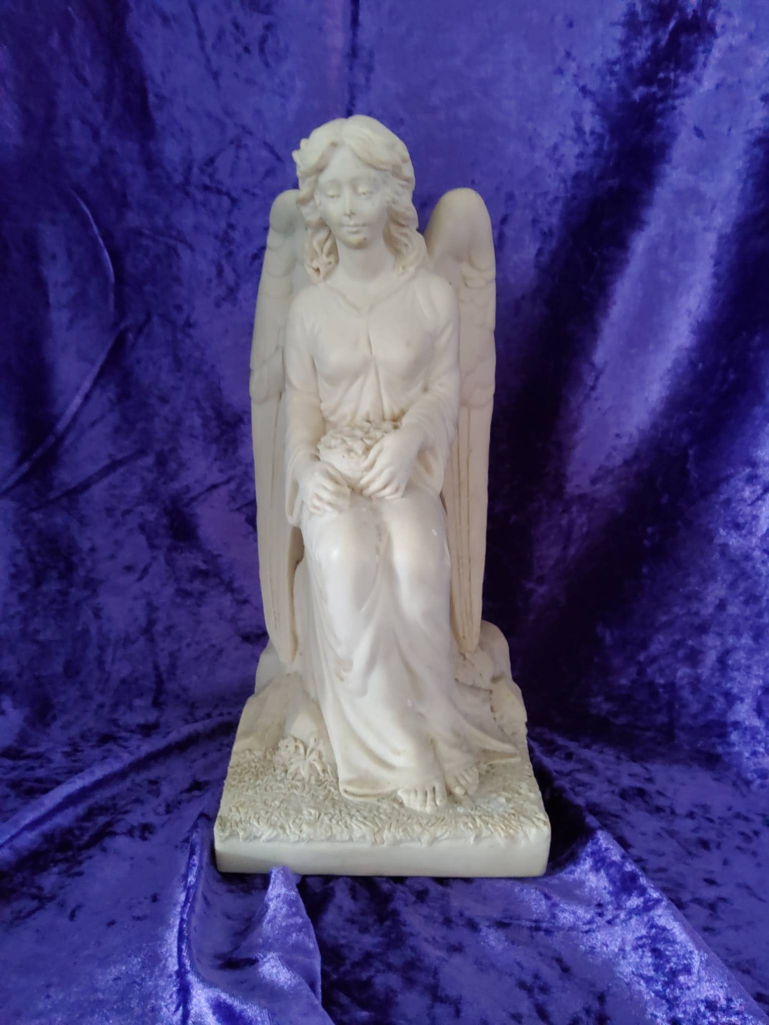 Angel Figurine in a Seated Pose