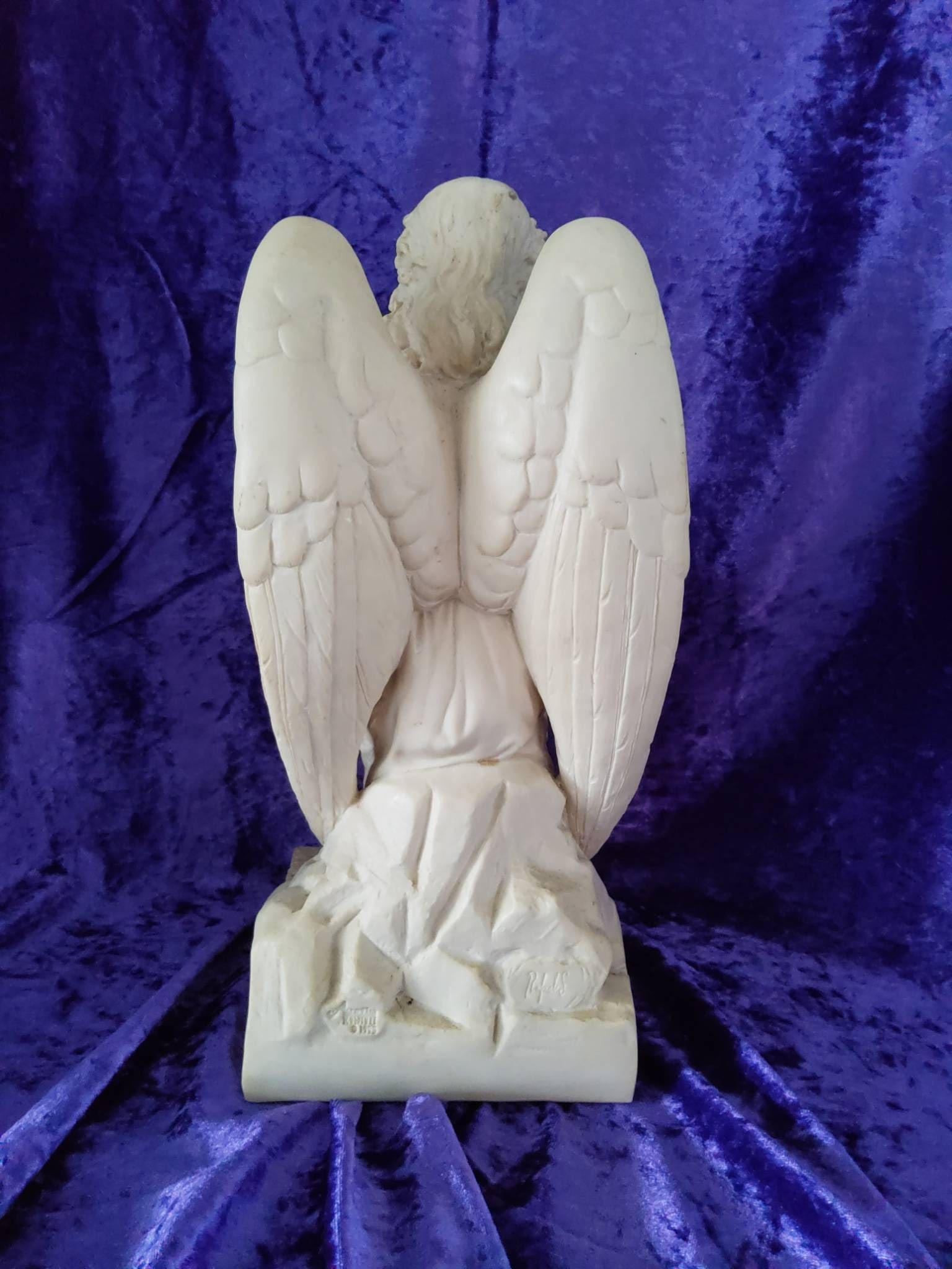 Angel Figurine in a Seated Pose