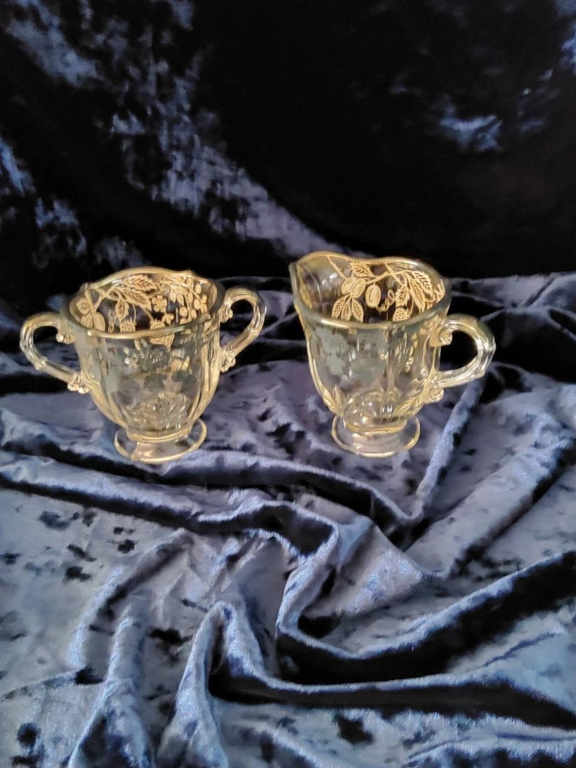 Glass creamer and sugar set with floral etching
