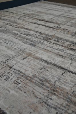 Nufloors Lovely 5 x 7 Area Rug. Fair Market Value of $250. Elevate your space instantly with 