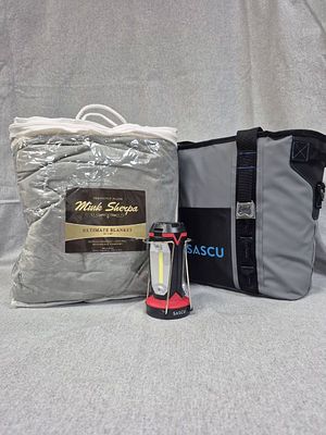 Cooler Bag + Goodies. Fair Market Value of $150. Get ready for cozy nights under the stars with 