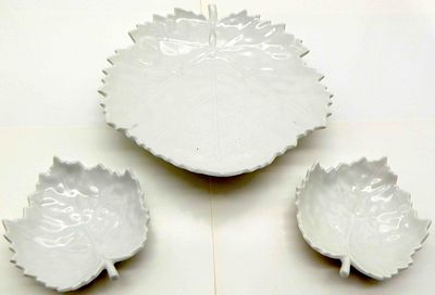 3 KPM leaf bowls. 3 KPM leaf-shaped bowls, glazed porcelain, large bowl designed by Johannes 