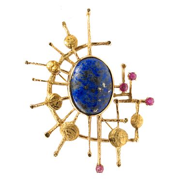 ALBERTO ZUCCHETTA &copy; (1938) - yellow gold, astral shape, embellished with a central lapis lazuli 