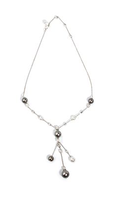 BULGARI - 18k white gold chain necklace with a fringed design, featuring alternating geometric 