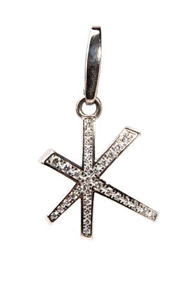 CARTIER - 18k white gold, featuring a stylised star with pav&eacute; set round brilliant-cut diamonds 