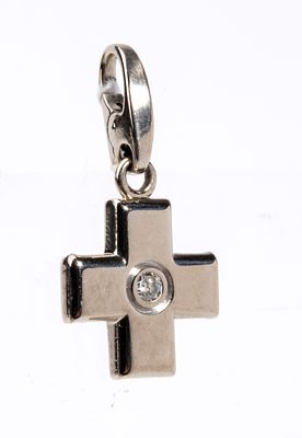 CARTIER - 18k white gold, in the shape of a Greek cross, set with a round brilliant-cut diamond 
