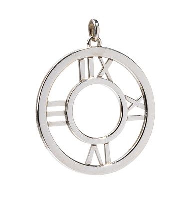 TIFFANY & CO.&reg; - In 18K white gold, in the shape of a stylised clock with Roman numbers. Signed 