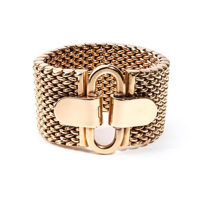 MARCHISIO - a soft, flexible structure featuring an 18k yellow gold rice-grain weave. Hallmarked 