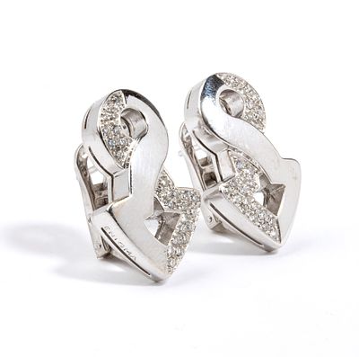 ENIGMA - 18k white gold, with round brilliant-cut pav&eacute; diamonds, estimated to weight a total of 
