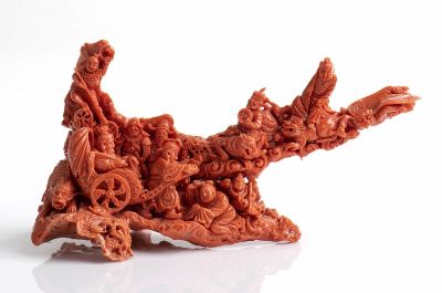 A Momo or Cerasuolo coral (Corallium Elatius) figural group depicting an Emperor on a chariot 