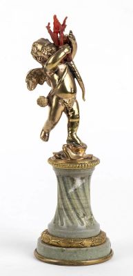 Gilded bronze sculpture depicting a winged putto supporting branches of Mediterranean coral 