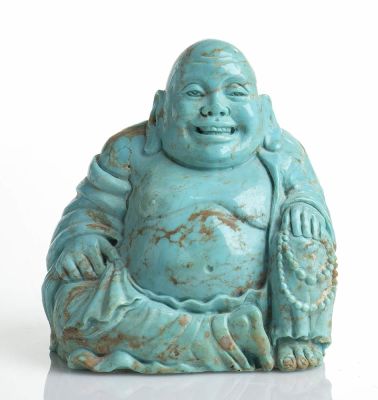 A turquoise sculpture depicting a smiling Buddha. Dimensions 69.7 x 45.9 mm, height 77.2 mm. 