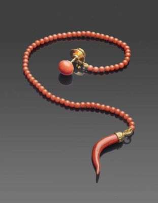 Lapel and pocket Mediterranean coral (Corallium Rubrum) amulet, sterling silver mounting. 