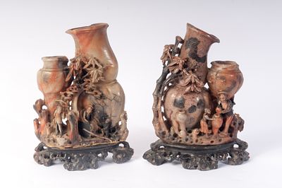 Pair of soapstone potiches, China, 19th century. 24 x 17.5 x 8 cm with decoration of scenes 