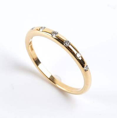 BULGARI - 18k yellow gold, set with 7 diamonds estimated to weigh a total of approximately 0.08 ct 