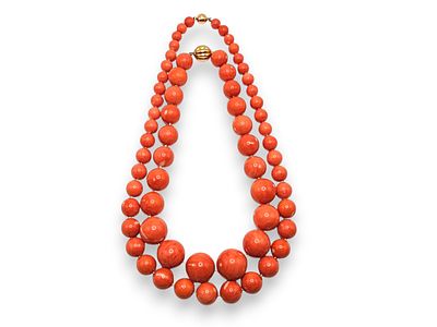 Two coral necklaces. each necklace with one strand of graduated Cerasuolo coral beads ( 