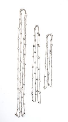 3 long gold and diamond chains. 18k white gold, each with a forzatina chain set with diamonds. 