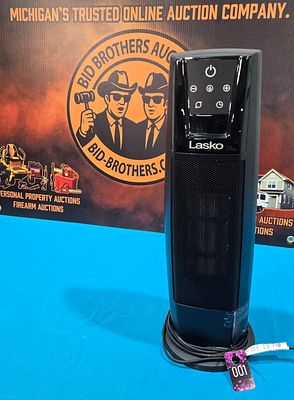 Lasko 20" oscillating electric heater.
