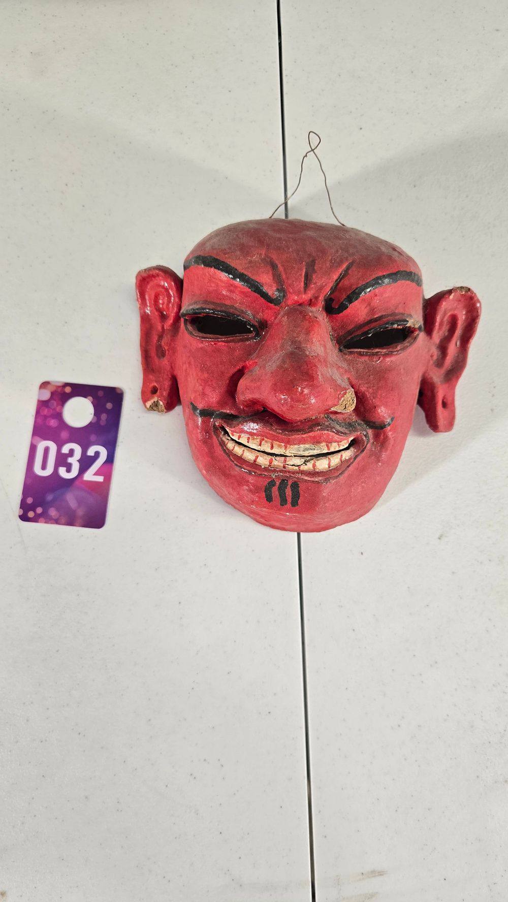 Lot 32: Hand Carved and painted wall hanging mask