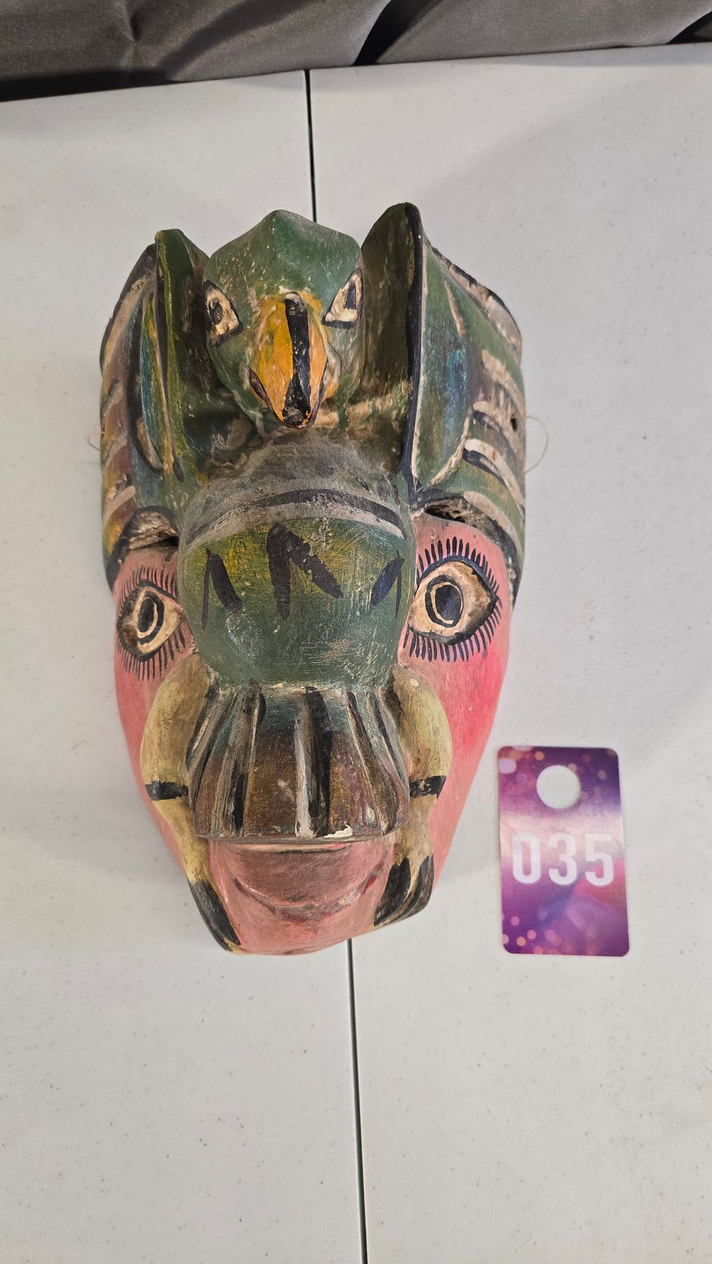 Lot 35: Hand Carved and painted wall hanging mask
