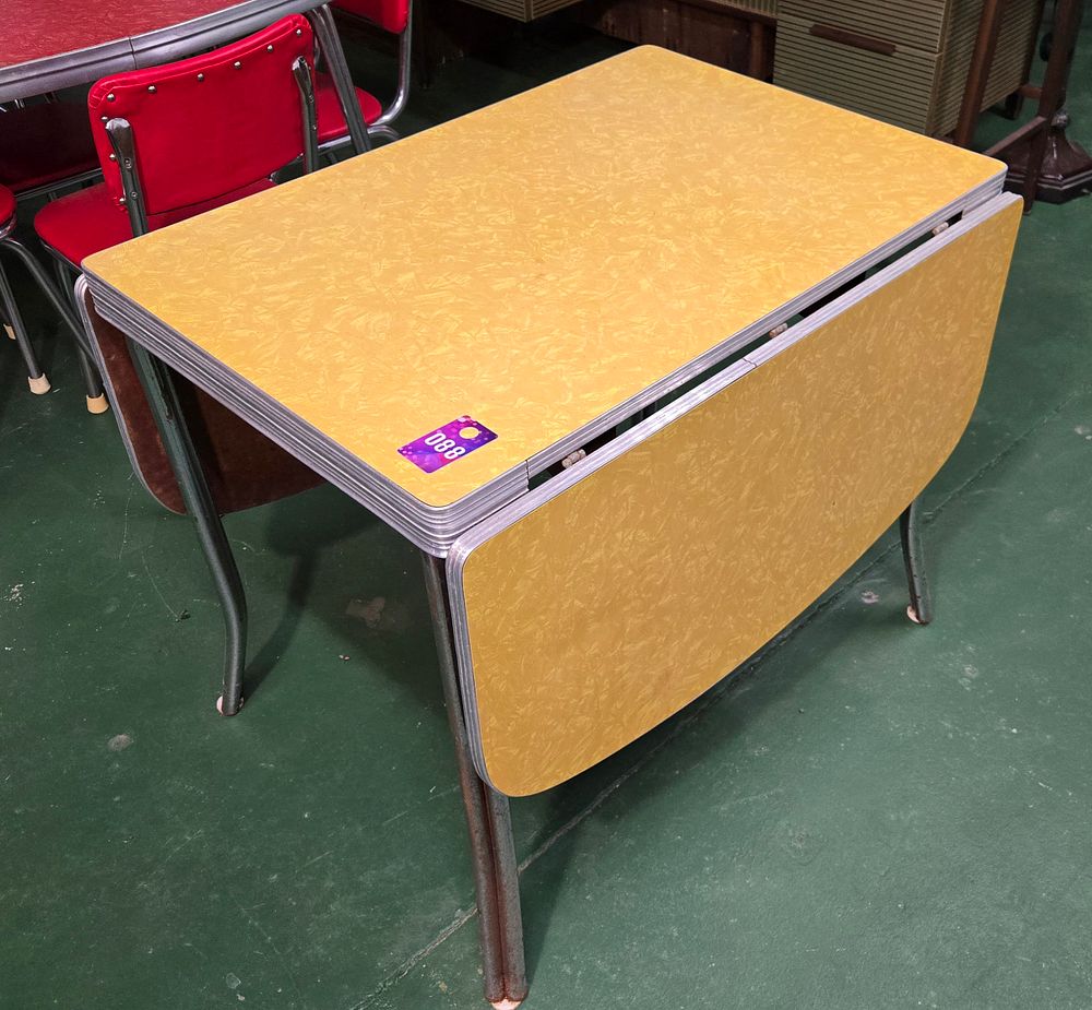 Lot 88: Vintage 1950's Yellow drop leaf table with metal frame