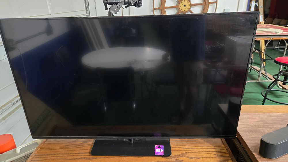 Lot 89: 55-inch Vizio TV (missing remote and power cord)