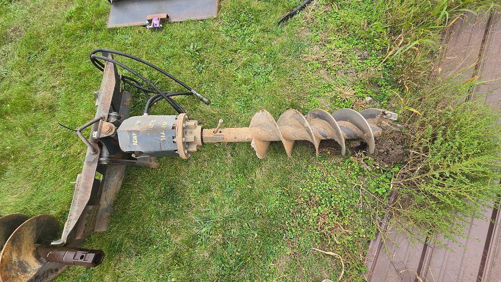 Lot 131: New Holland Skid Steer Auger with 12" auger and (2) 18" inch augers. Standard Flow (Operates good)