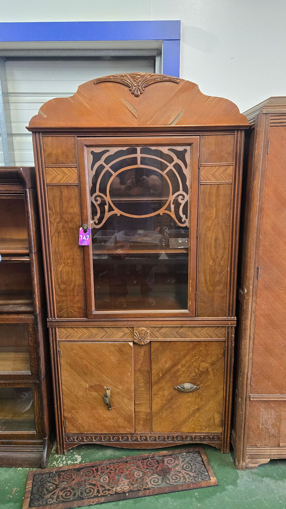 Lot 147: Glass front hutch