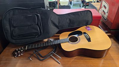 Hohner Model HW 220 acoustic guitar with case and hangers