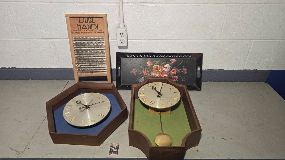 Lot 258: Washboard, 2 Howard Miller clocks and serving tray