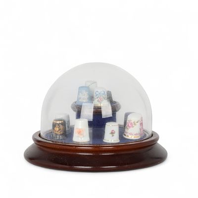 PHILAE - COLE&Ccedil;&Atilde;O DE DEDAIS. Conjunto composto por 12 dedais em porcelana e biscuit decorados com 