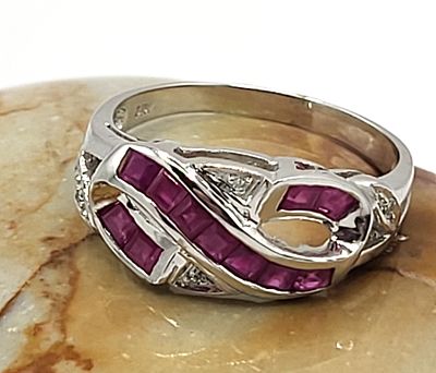 Square-cut Ruby and Round Diamond Infinity Ring. All weights, sizes, measurements, as well as 