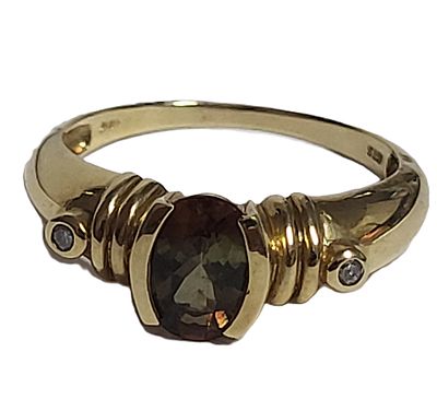 Amazing Color-Changing Andalusite & Diamond Ring. Andalusite is a gemstone that most of the 