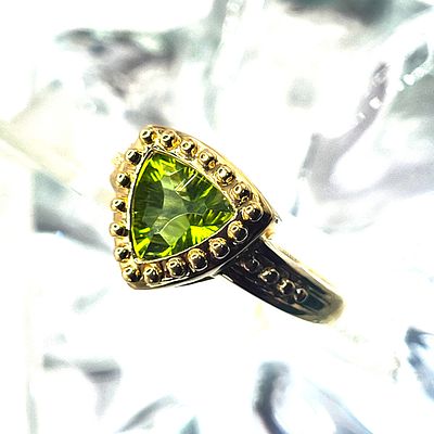 Fancy Trilliant-Cut Peridot Ring. Here's Just The Basics! 
Metal-Color Weight 