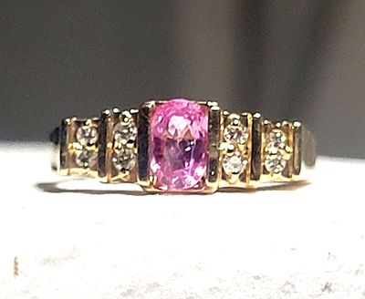 Fancy Pink Sapphire and Diamond Ring. This bubble-gum colored pink sapphire is fancy by nature 