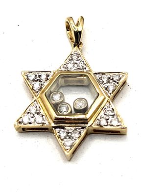 Star of David Pendant Featuring Floating Diamonds 14K. The interior diamonds are encapsulated in 