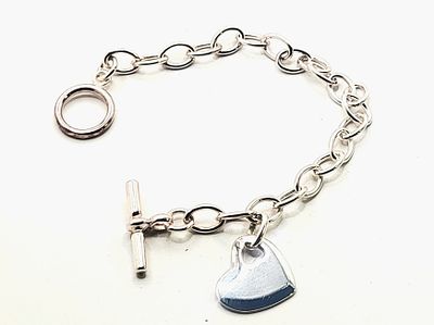 Rolo Link Toggle Bracelet w/ Dangling Heart Tag. This sterling silver bracelet is approximately 