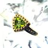 Fancy Trilliant-Cut Peridot Ring. Setting: 14K Yellow Gold 
Main Gemstone: Genuine Peridot Image - 1