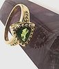 Fancy Trilliant-Cut Peridot Ring. Setting: 14K Yellow Gold 
Main Gemstone: Genuine Peridot Image - 4
