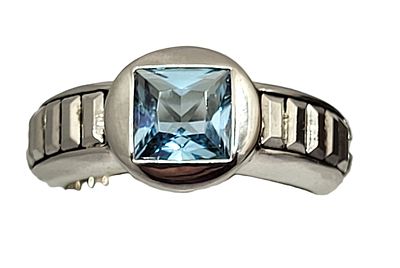 Swiss Blue Topaz Unisex Ring - Designer Quality. Setting: Sterling Silver .925
Main