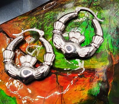 Love of the Irish White Gold Claddagh Hoops. Made of: 14K White Gold 
Figural of: The 