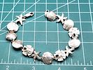 Seashells, Sand Dollars, Starfish, and Scallops Bracelet. Cast in: Sterling Silver .925 
Image - 6